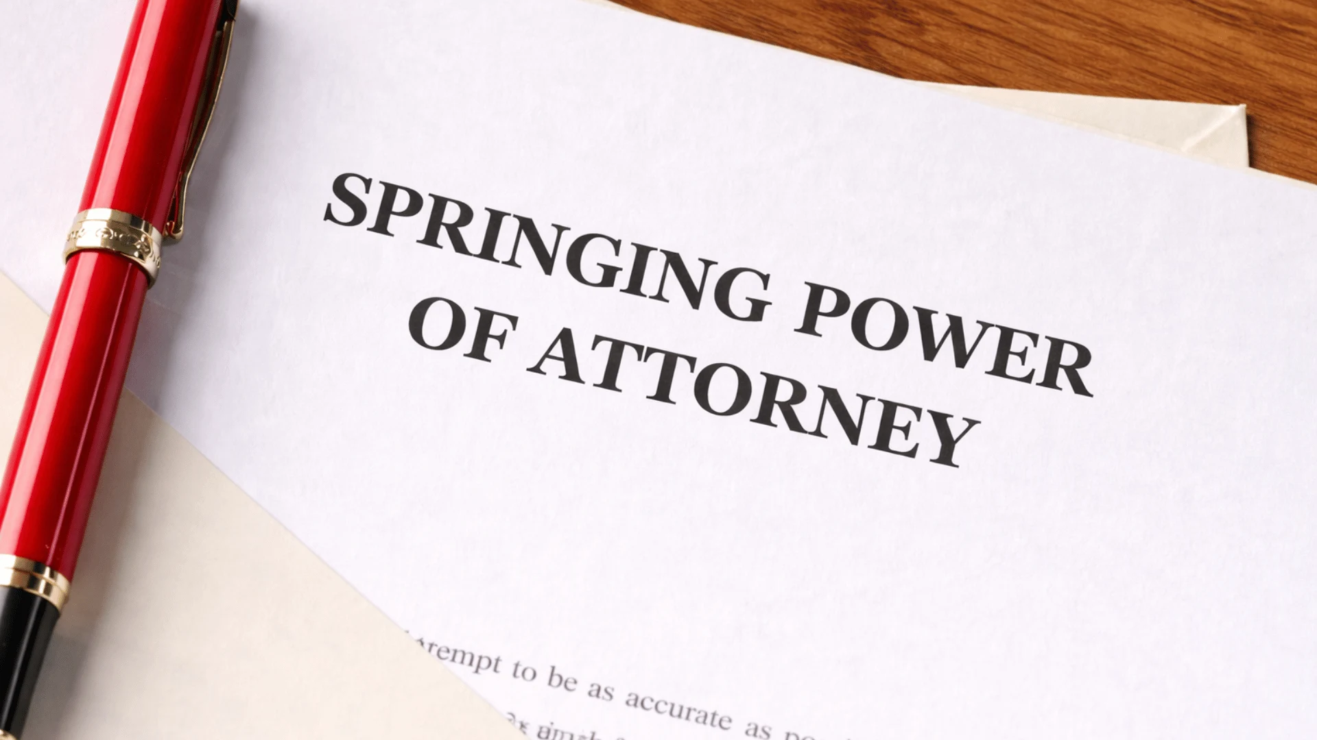 Document titled Springing Power of Attorney on white paper with a red pen