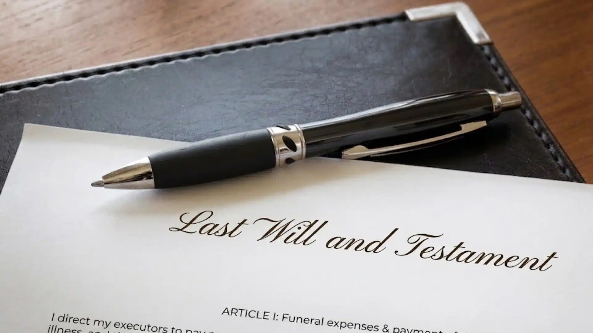 Last will and testament document with pen on desk, symbolizing estate planning, inheritance, and legal documentation