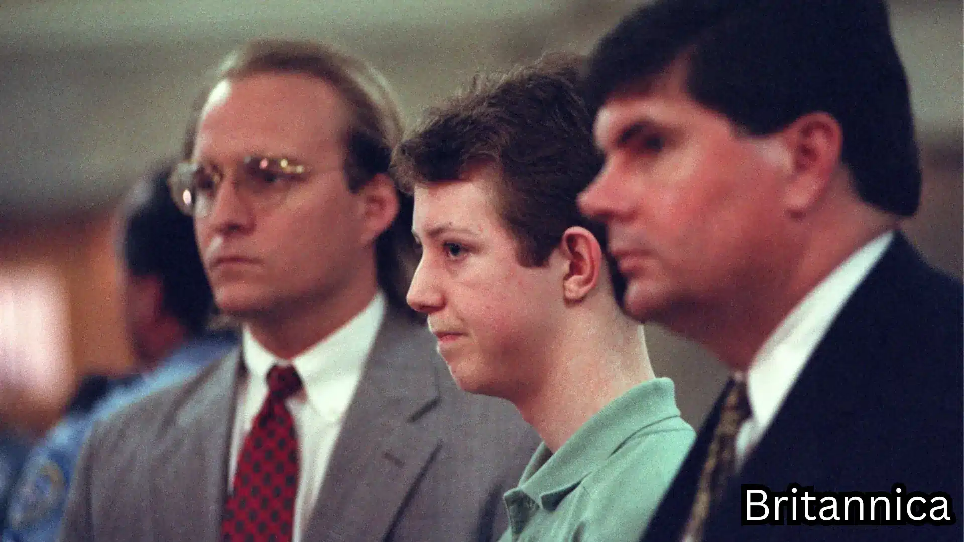 Young defendant seated between two attorneys during a West Memphis Three courtroom hearing.